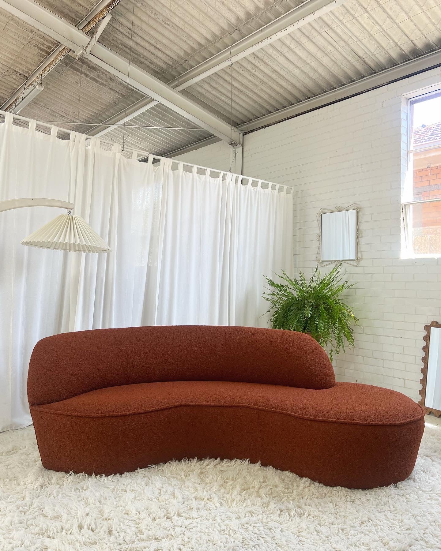 - Bespoke Rust Boucle Curved Sofa