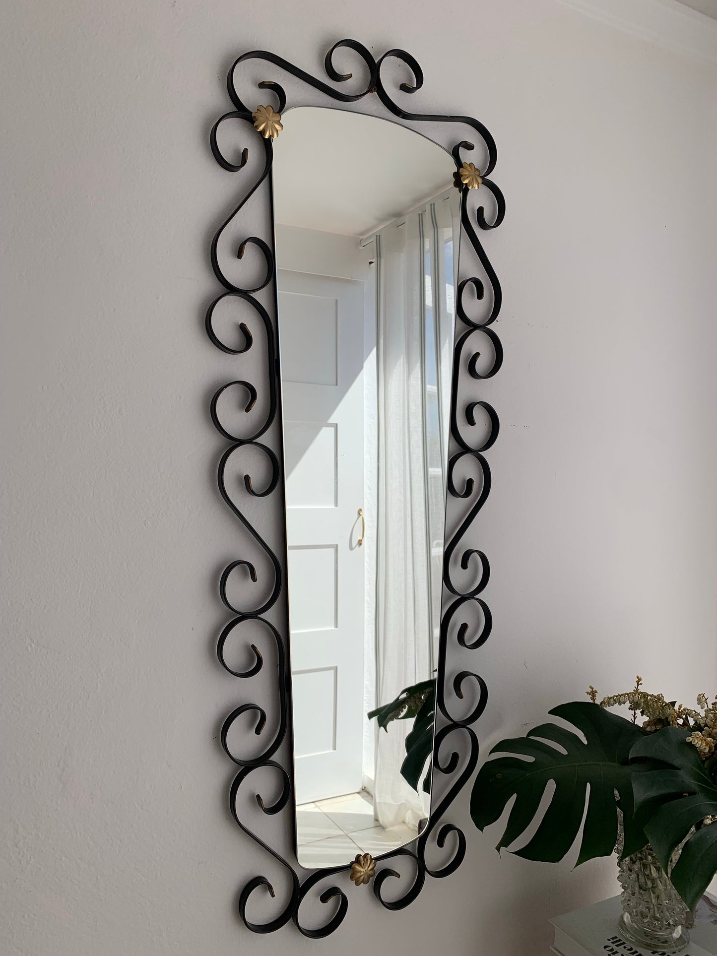 French Curved Iron and Brass Mirror