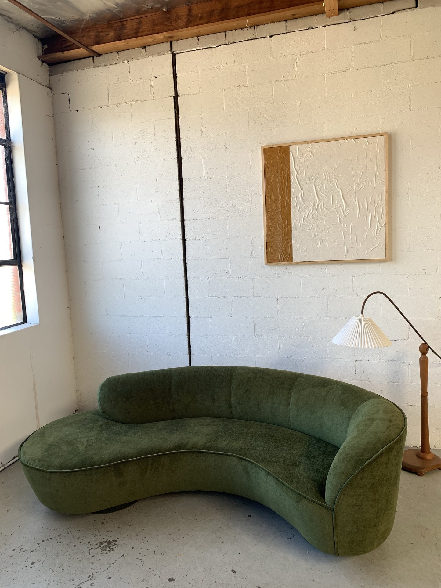 Curved Velvet Sofa in Deep Botanical Green