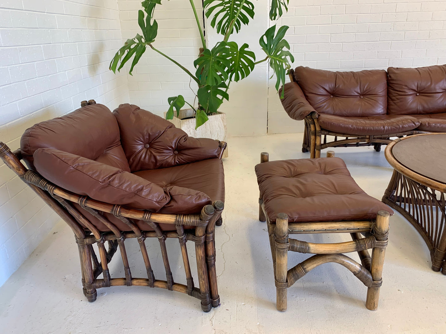 Vintage Cane and Leather Armchair + Ottoman