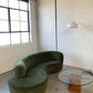 Curved Velvet Sofa in Deep Botanical Green