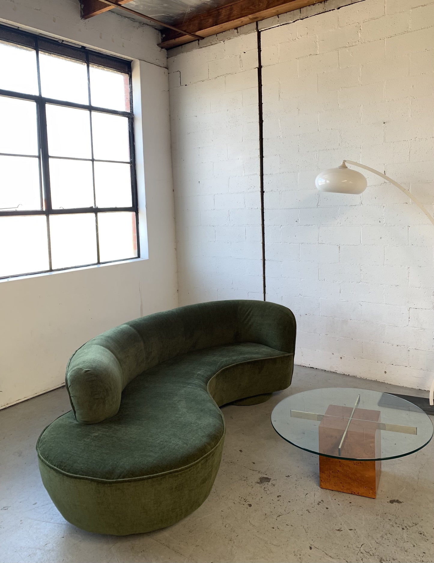 Curved Velvet Sofa in Deep Botanical Green