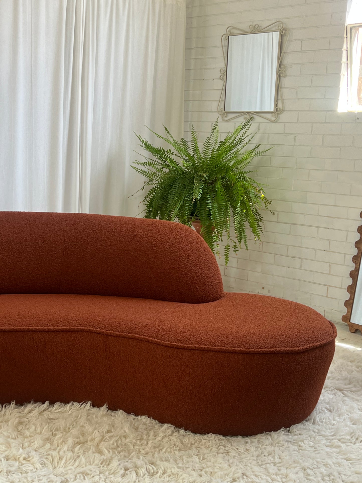 - Bespoke Rust Boucle Curved Sofa