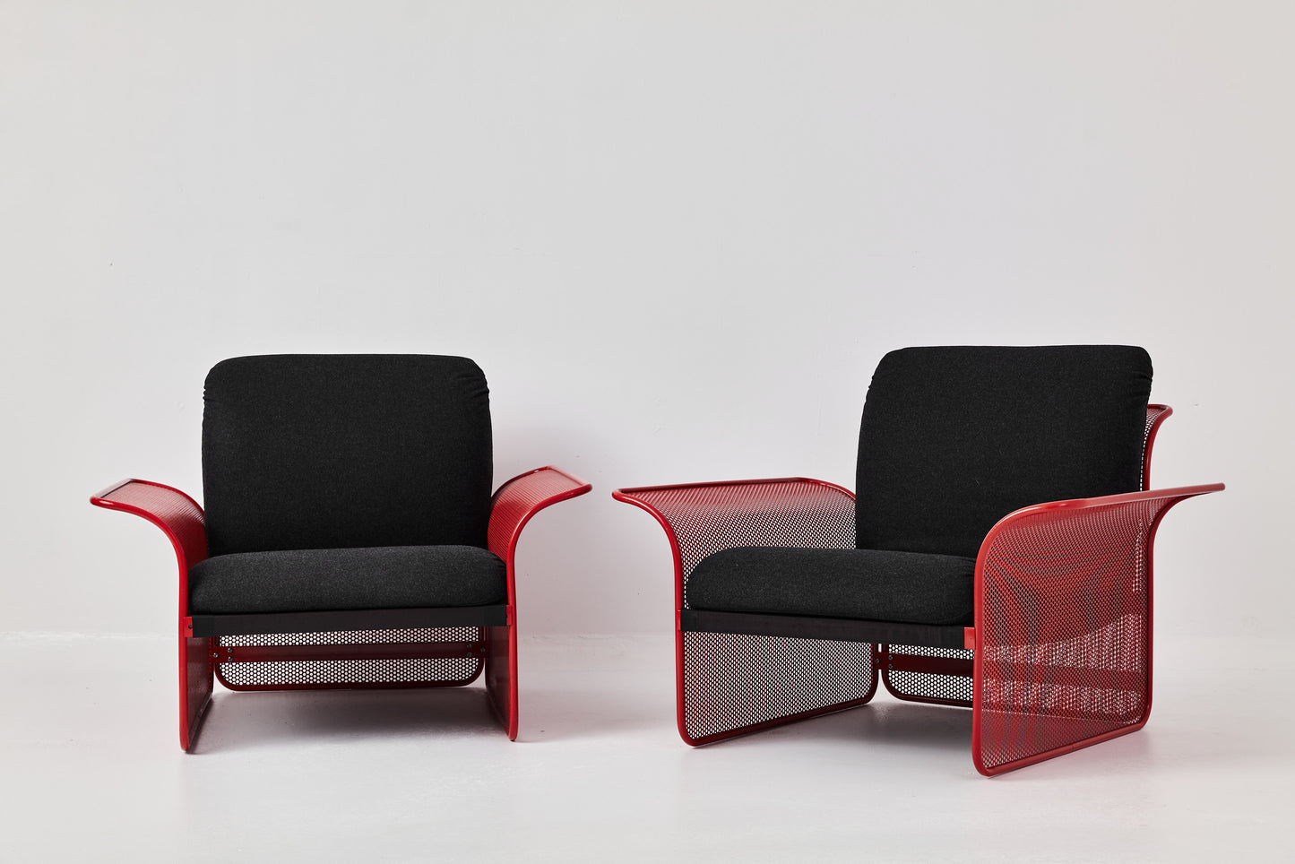 Restored Red perforated steel lounge chair - One available