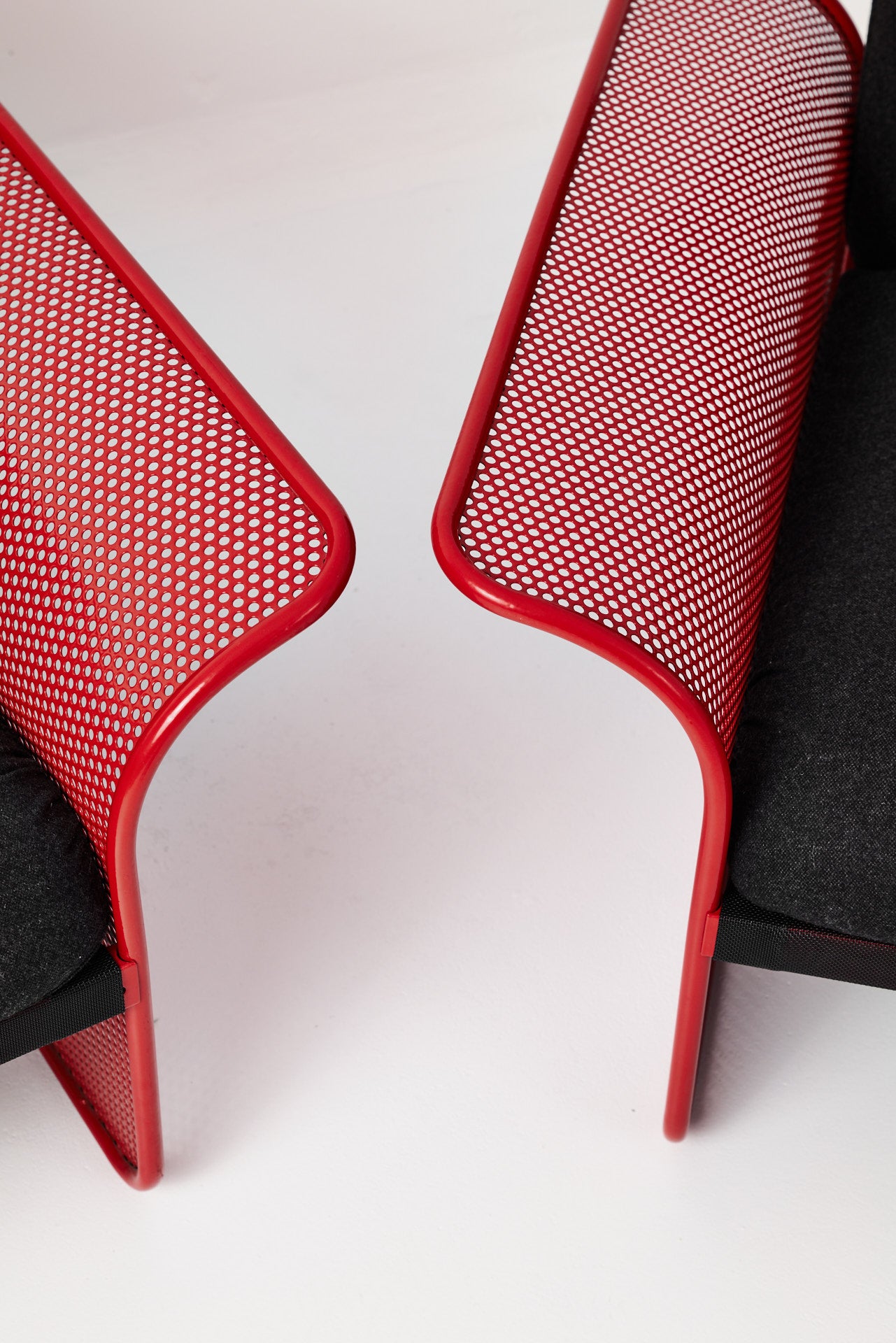 Restored Red perforated steel lounge chair - One available