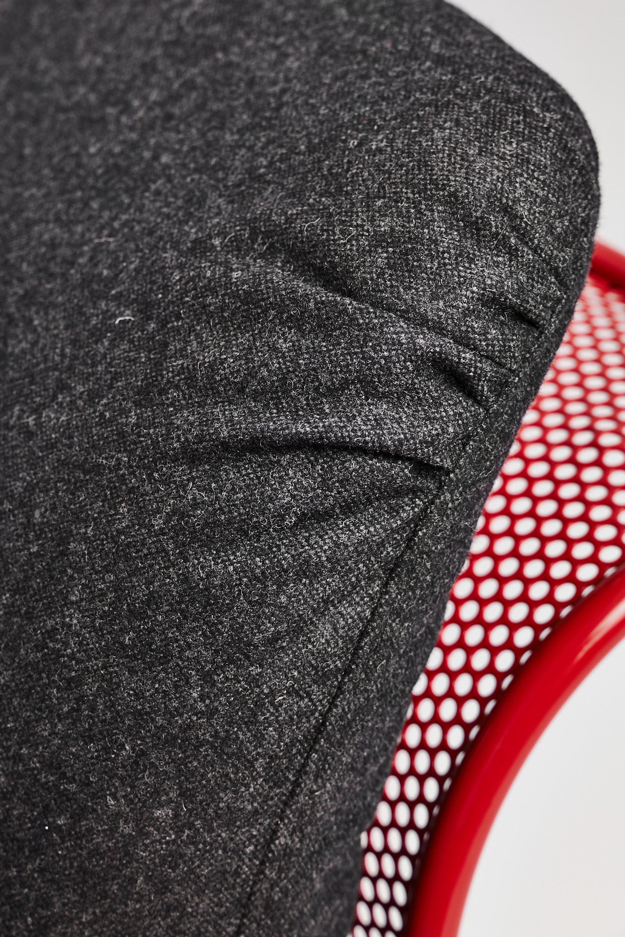 Restored Red perforated steel lounge chair - One available