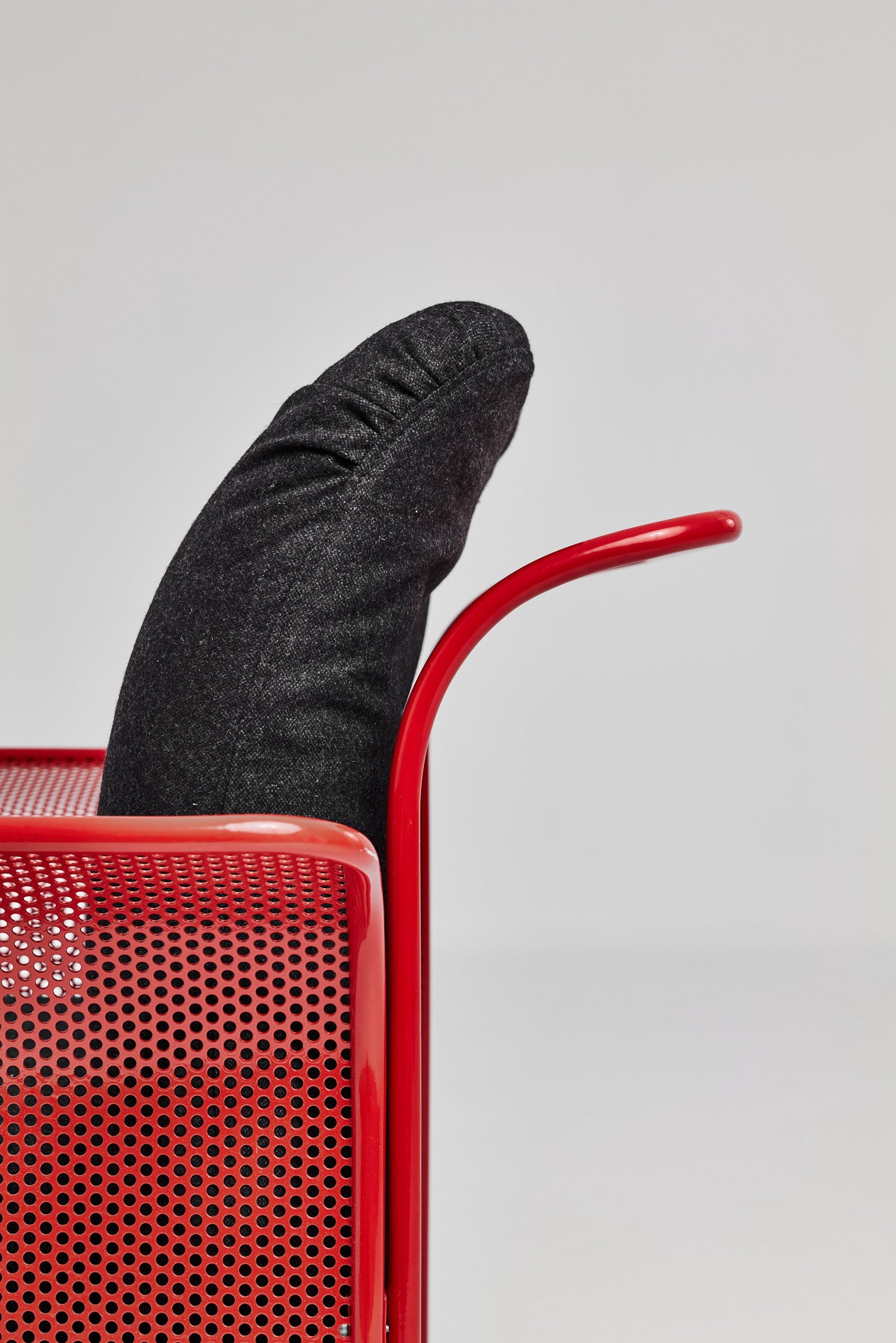 Restored Red perforated steel lounge chair - One available